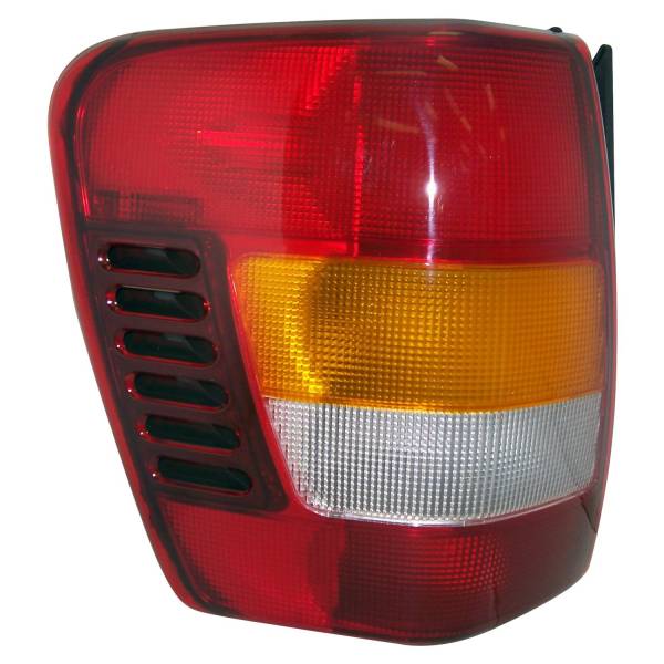 Crown Automotive Jeep Replacement - Crown Automotive Jeep Replacement Tail Light Assembly Left For Use w/ 2001-2004 Jeep WG Europe Grand Cherokee After 11/12/01 Has Darker Edges Than Earlier Lamp PN[5101899aa]  -  55155143AG - Image 1