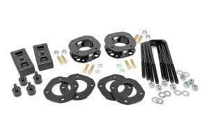 Rough Country Suspension Leveling Lift Kit 2.5-3 in. Lift Incl. Strut Extensions Strut Plates Bumpstops Lift Blocks U-Bolts Hardware - 87001