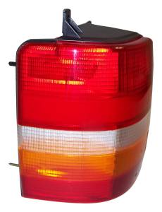 Crown Automotive Jeep Replacement Tail Light Assembly Left For Use w/ 1994-1996 Jeep ZG Europe Grand Cherokee Left w/4 Large Bulbs No Side Holes  -  55155117