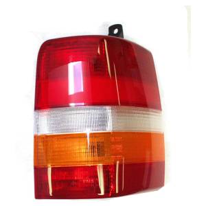 Crown Automotive Jeep Replacement - Crown Automotive Jeep Replacement Tail Light Assembly Right For Use w/ 1997-1998 Jeep ZG Grand Cherokee Europe Only Right w/4 Large Bulbs No Side Holes  -  55155740AA - Image 1