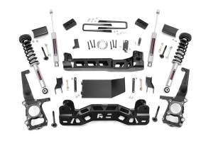 Rough Country Suspension Lift Kit 4 in. Black Series Front Lifted Knuckles Upper Strut Spacers Front/Rear Cross Member Sway-Bar Drop Brackets Brake Line Brackets Driveshaft Spacer - 57431