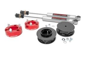 Rough Country Suspension Lift Kit w/Shocks 3 in. Lift Incl. Front Strut Ext. Rear Coil Spring Spacers Hardware Rear Premium N3 Shocks Red - 76530RED